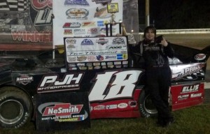 Ronny Lee Hollingsworth of Northport, AL celebrates his NeSmith Chevrolet Dirt Late Model Series win on Tuesday night driving the Sparks Motorsports Special in the Rock Auto.com Speedweeks Presented By Racecar Engineering opener at Bubba Raceway Park in Ocala, FL. (Trace Crisp Photo)