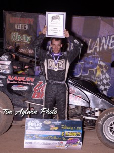Bryan Clauson in victory circle. Photo by Tim Aylwin.