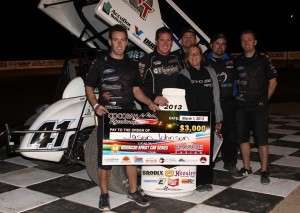 Jason Johnson stands with his wife and crew following his victory on the opening night of the Cocopah Cup Challenge at the Cocopah Speedway.in Somerton, Ariz. (ASCS Photo / Bryan Hulbert) 