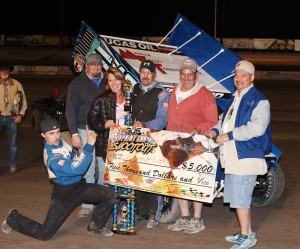 Lorne Wofford added his name to the list of winners of the ASCS 305 Sprint Car Shootout, celebrating with crew and family including 2011 champion, his son, Wes Wofford who rock started victory lane. (ASCS Photo / Hulbert Photography) 