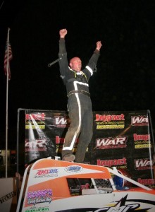 Chris Parkinson of Gladstone MO celebrates his W.A.R. victory at Double-X Speedway. 6-9-13