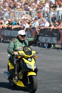 John Force acknowledges the crowd at Gateway Motorsports Park in 2014