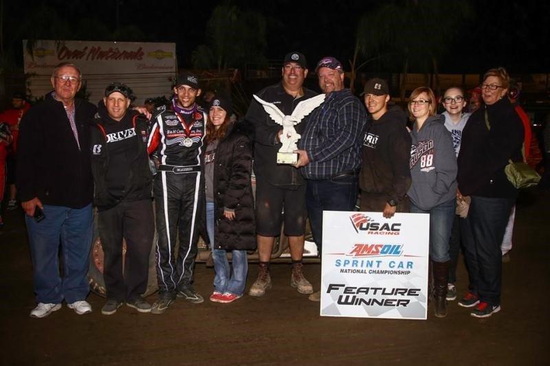 Bryan Clauson and the Dooling/Hayward crew celebrate in victory lane after winning Saturday night's running of the Budweiser "Oval Nationals" presented by All Coast Construction at Perris (Calif.) Auto Speedway. (Rich Forman Photo) 
