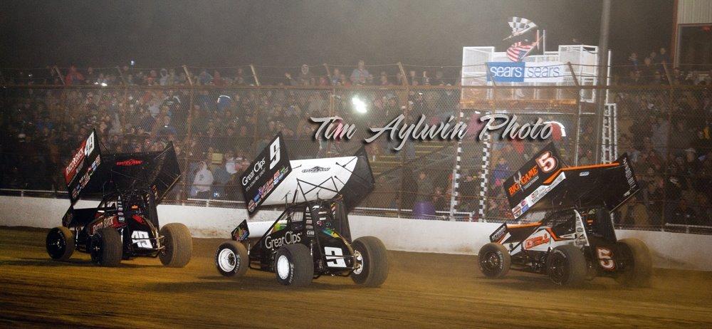 Brad Sweets edges Daryn Pittman and David Gravel to win at Cotton Bowl Speedway. - Tim Aylwin photo.