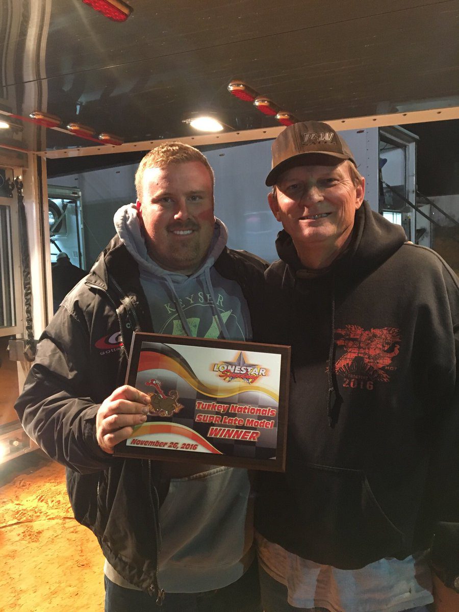 Morgan Bagley (left) joined by car owner Wayman McMillan after topping the Topless Turkey Nationals at Lone Star Speedway.